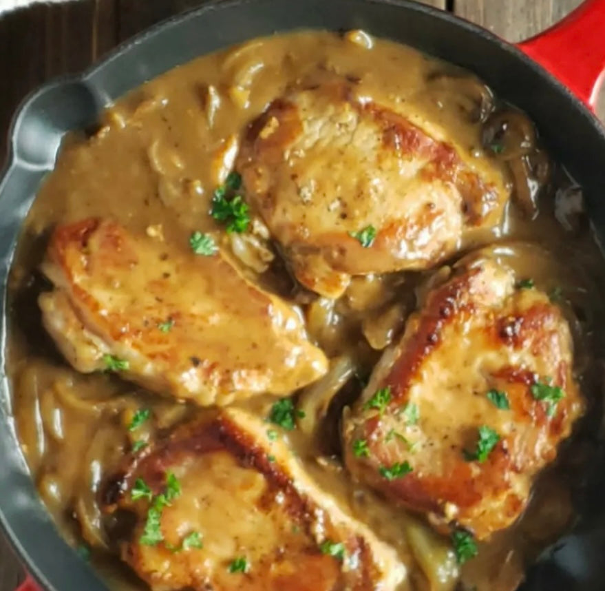 Onion and mushroom gravy smothered pork chops