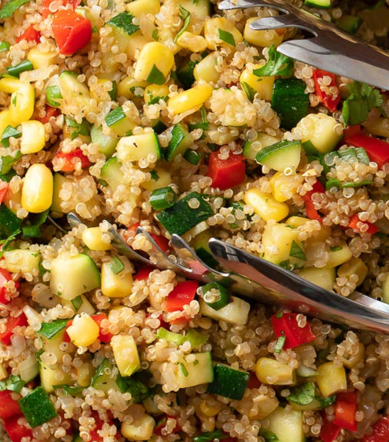 Quinoa salad with veggies fresh lemon and herbs